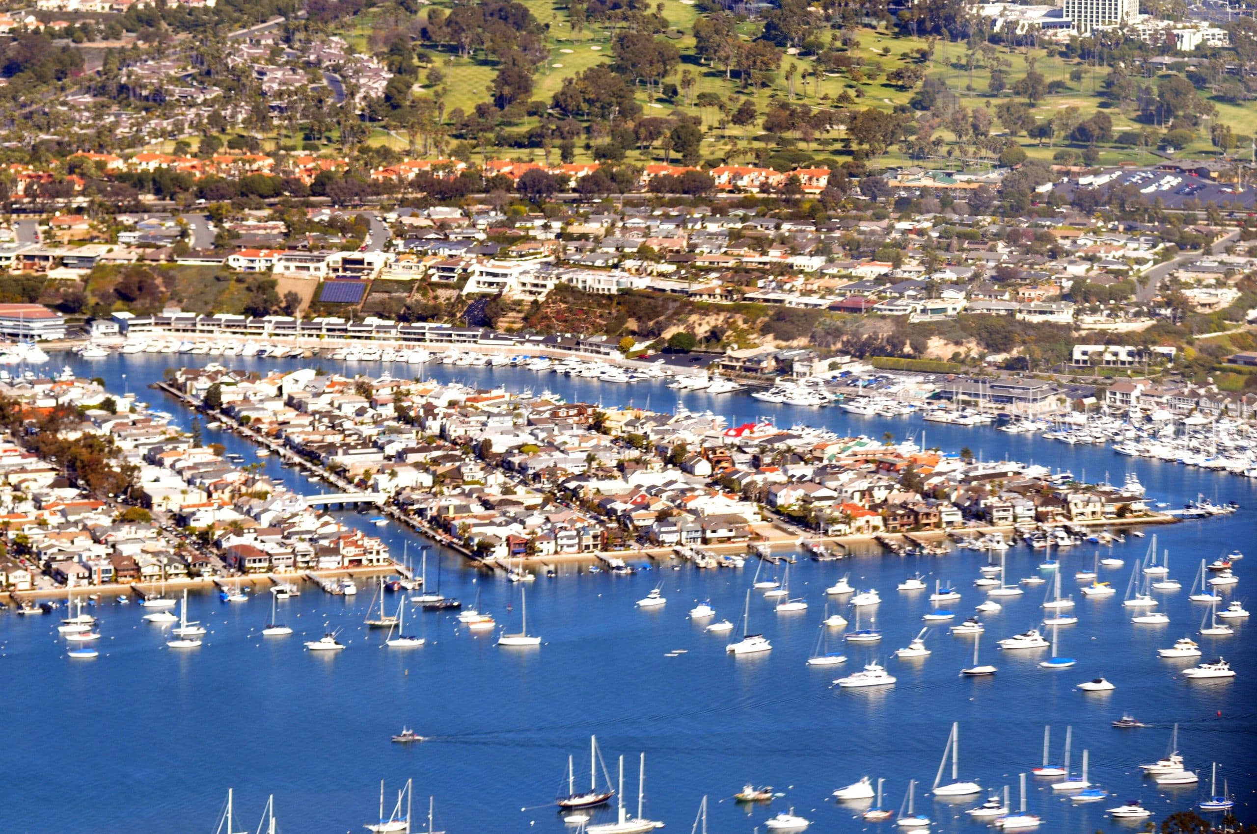 Aerial view of homes and boat docks on Little Balboa Island and Newport Harbor