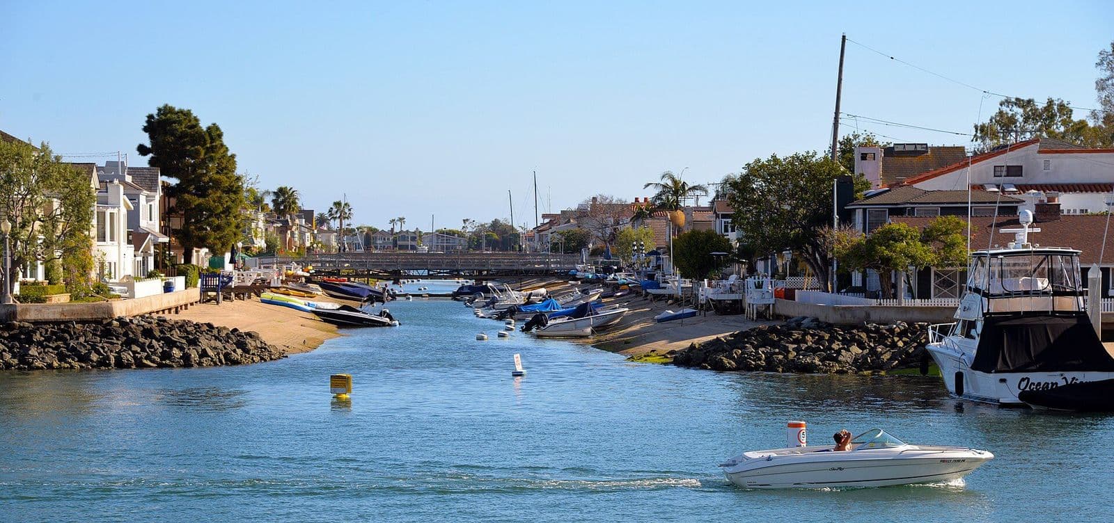 Homes and moored boats along the Grand Canal on Balboa Island